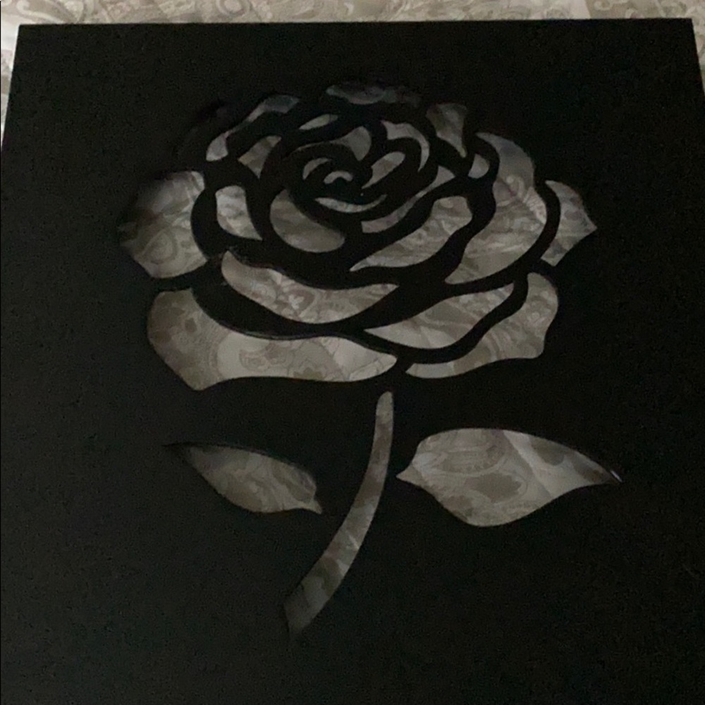 Picture of a cut out of a rose $10